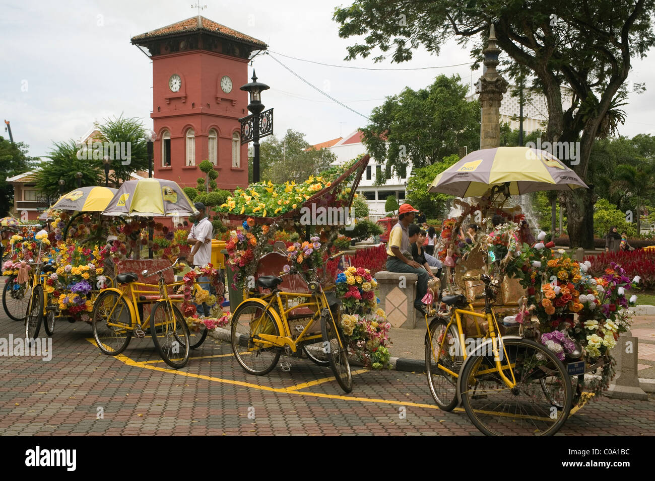 Malaysia Malacca (Melaka) Clocktower & trishaws Stock Photo
