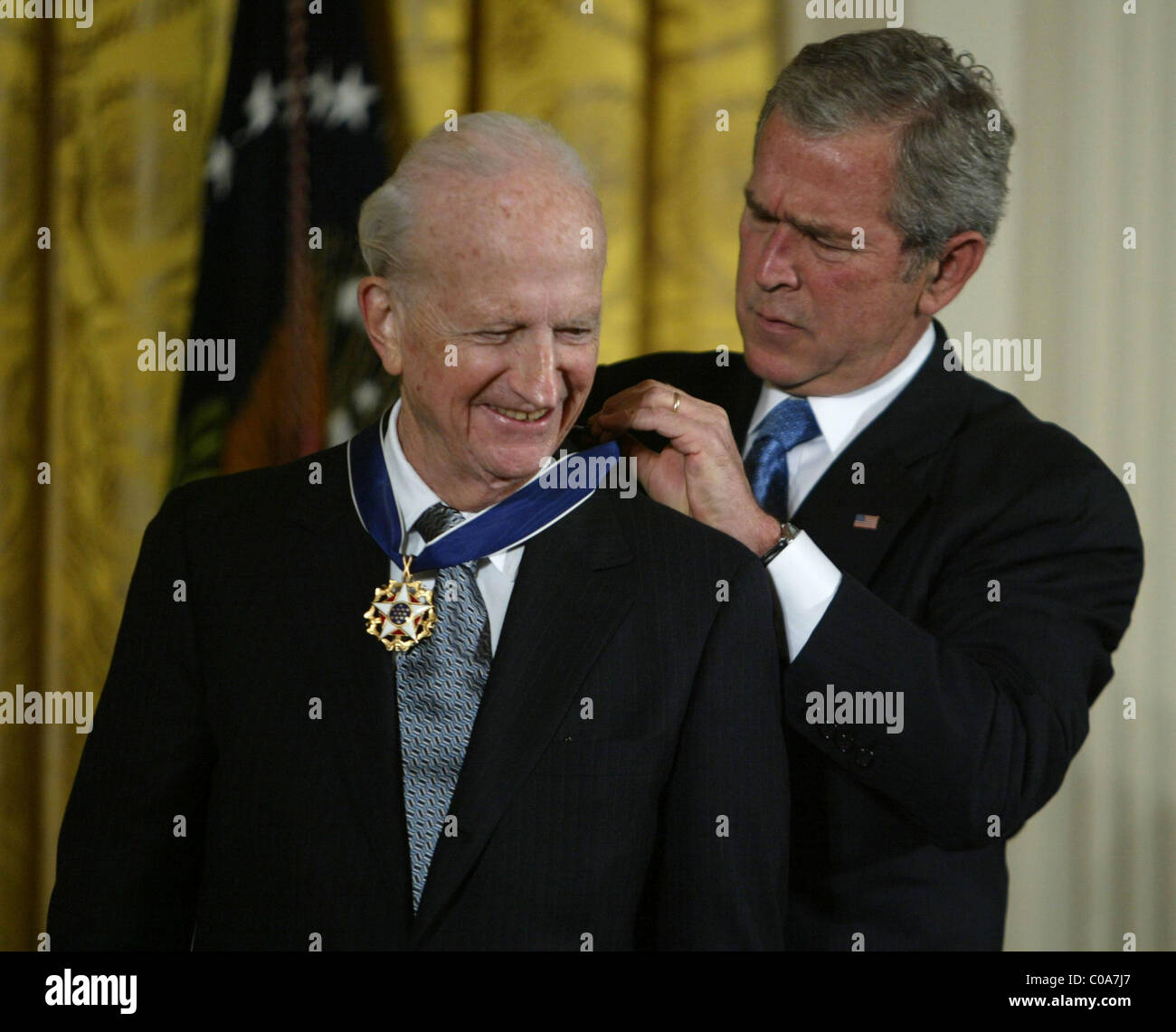 President George Bush awarding 1992 Nobel Prize winner Gary Becker with the Presidential Medal of Freedom for his economics Stock Photo