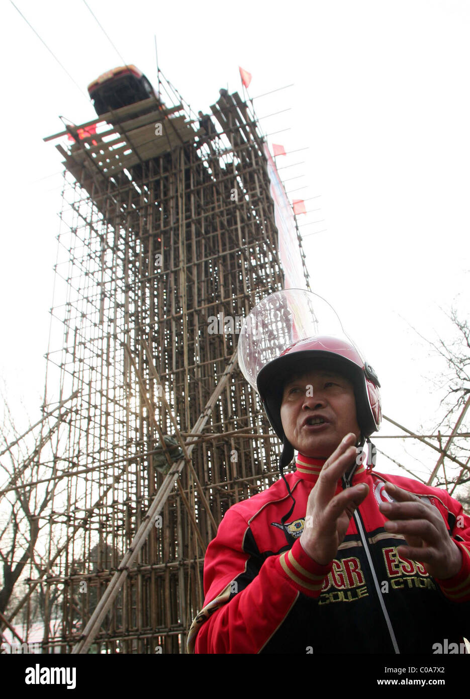 DRIVER TAKES A TIGHT-ROPE ROUTE This mad motorist will drive his car ...