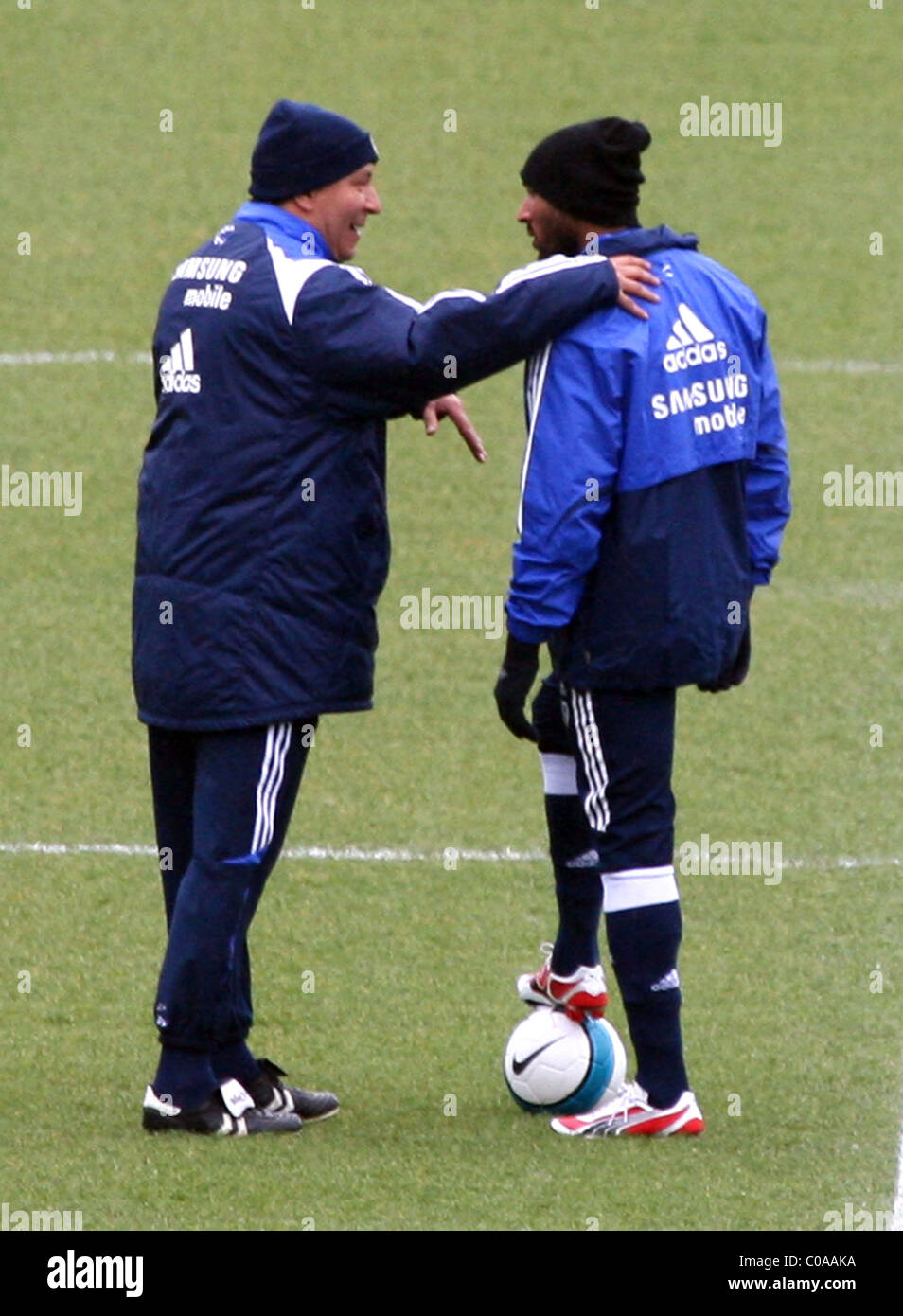 Nicolas Anelka Appears To Be Congratulated By A Member Of The Chelsea Stock Photo Alamy