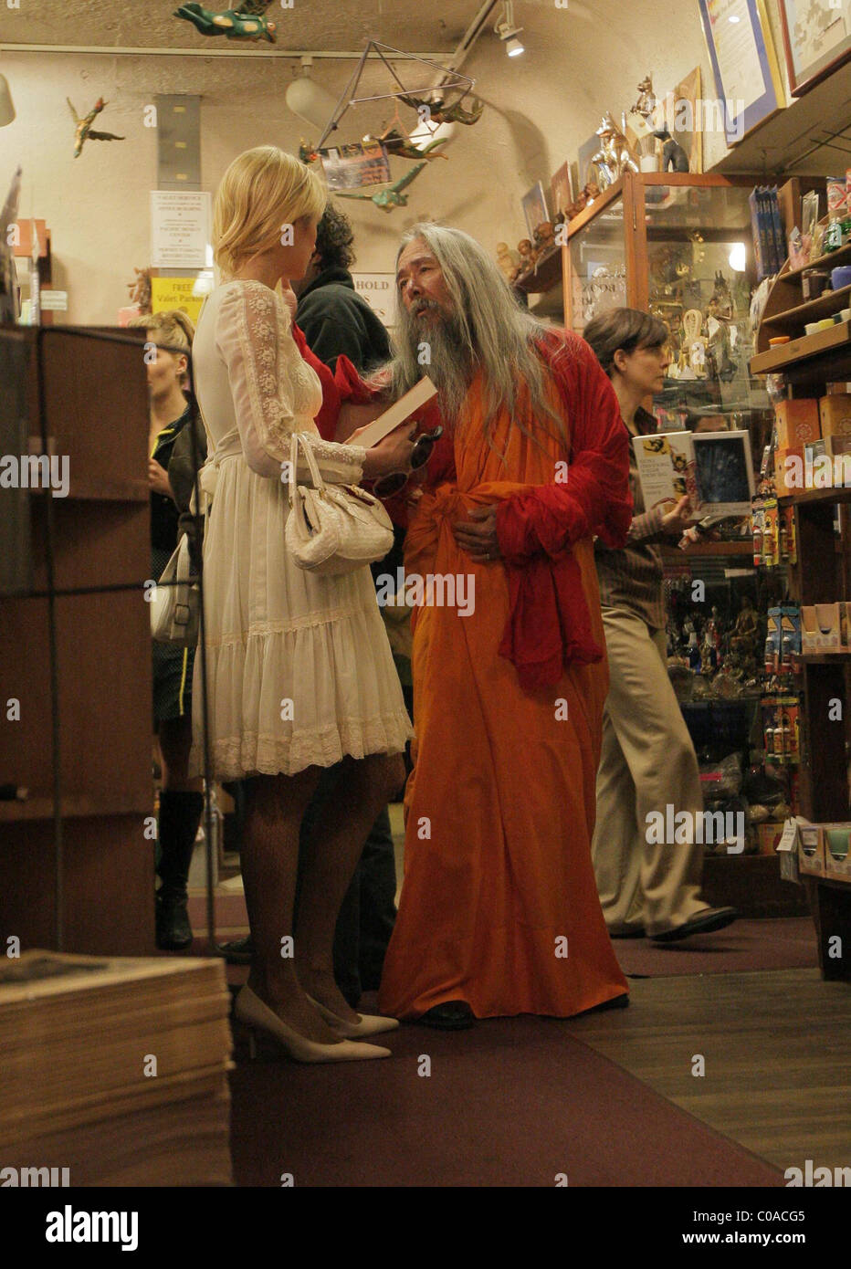 Paris hilton shopping at the bodhi tree bookstore with a shaman for