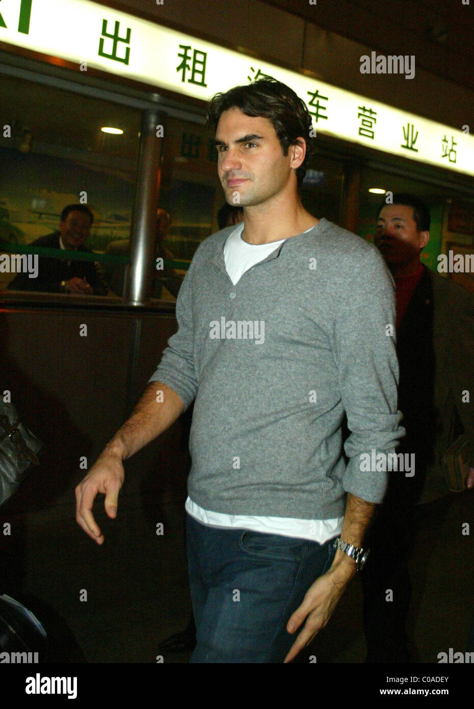 Tennis ace Roger Federer arrives at Shanghai International Airport for the Masters Cup Shanghai