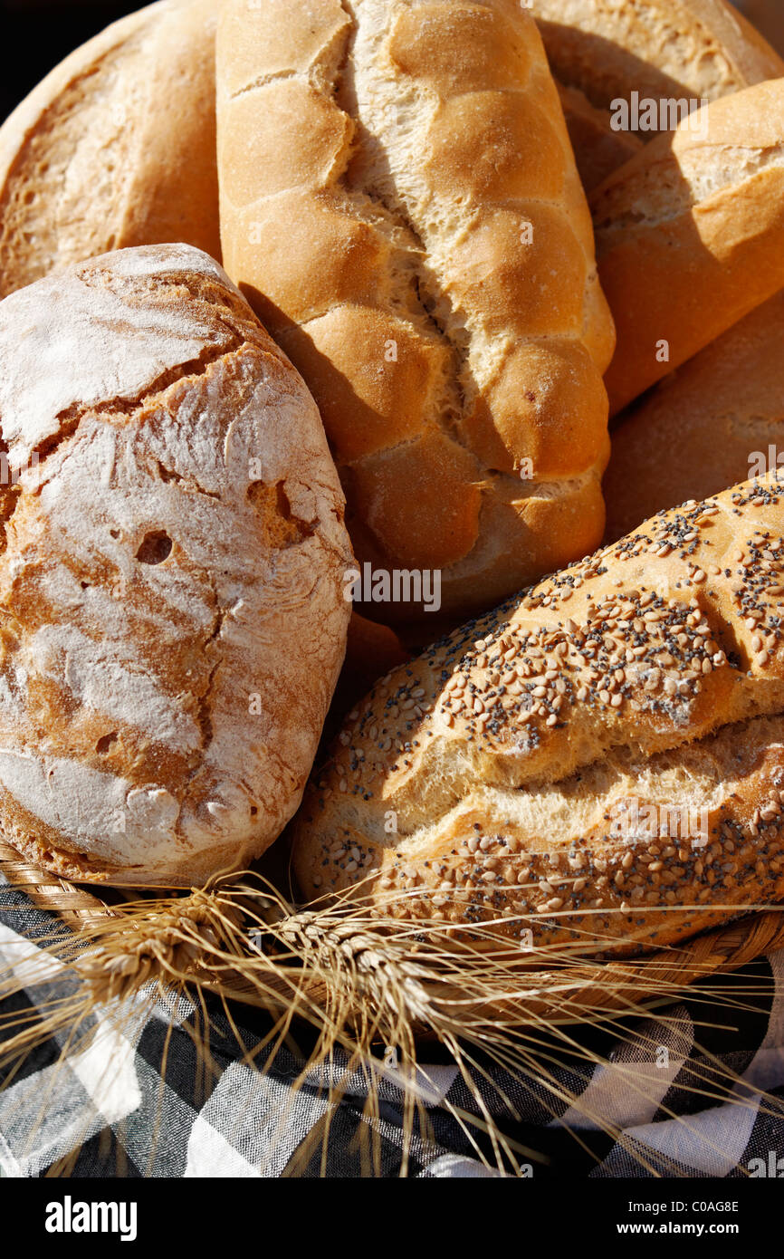 A variety of bread in a breadbasket Stock Photo Alamy