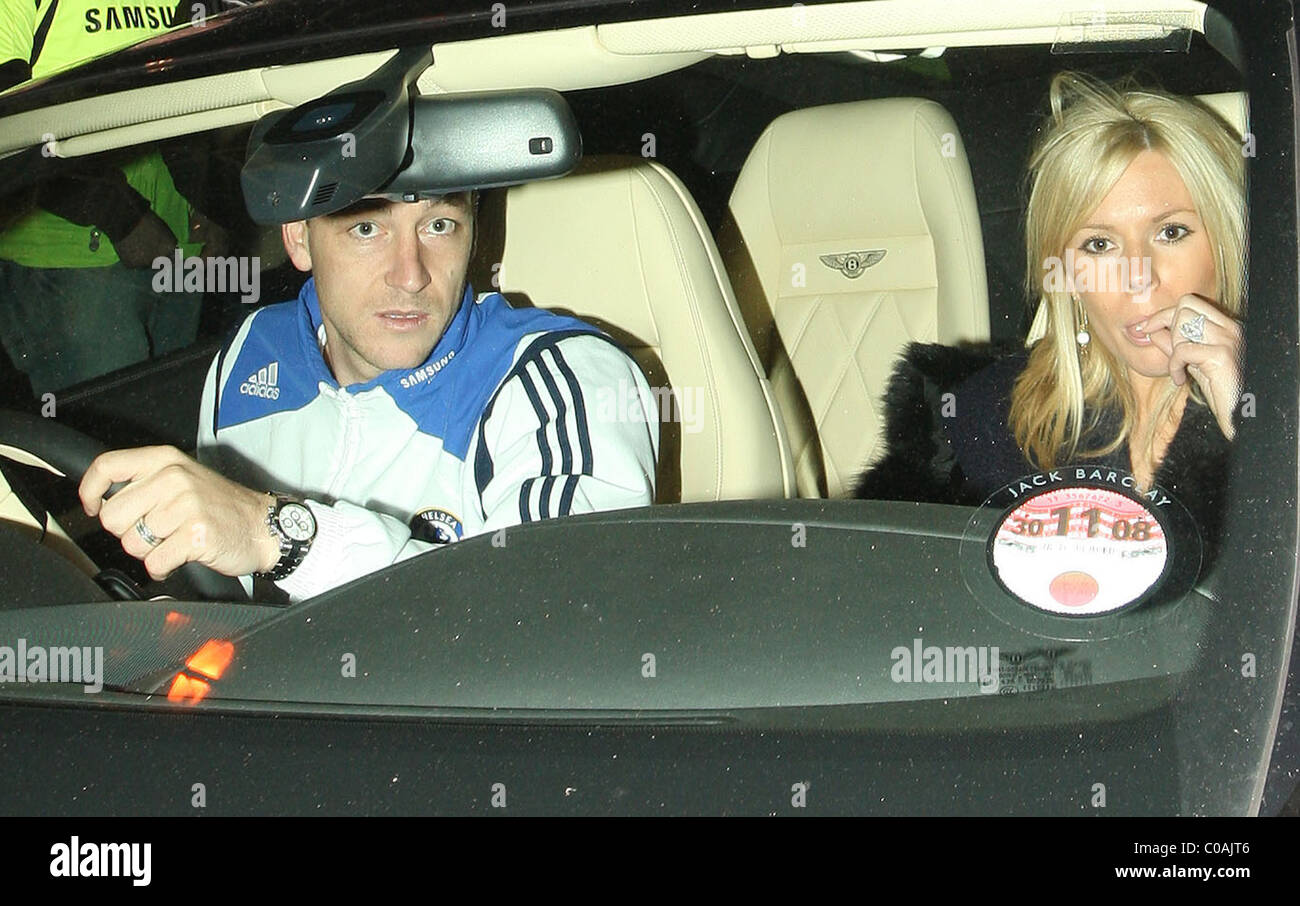 John Terry and Toni Poole Terry leave Stamford Bridge without wearing their seat belts London, England - 13.03.08 Stock Photo