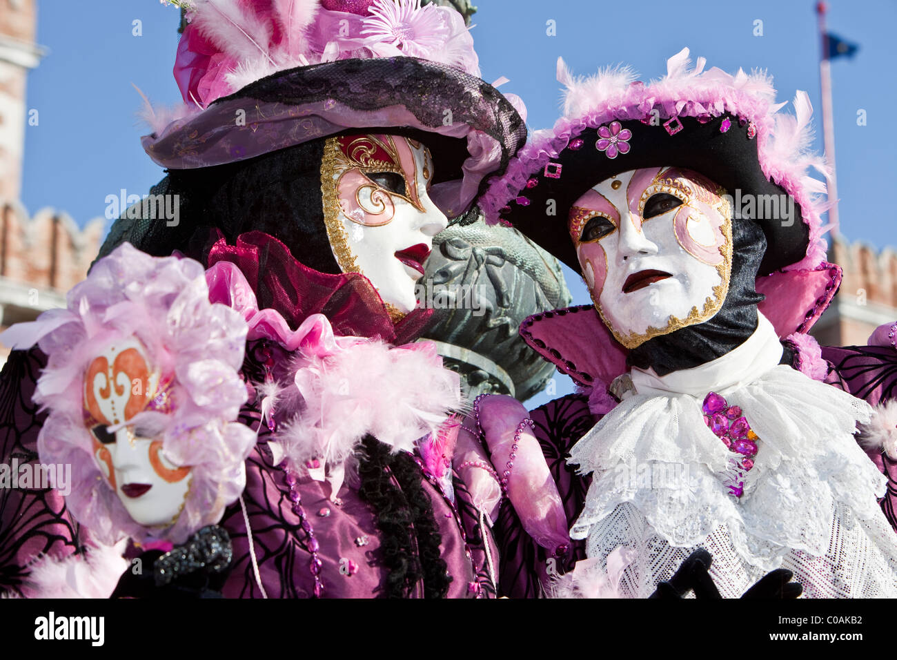 Two people in costume at the Venice Carnival Stock Photo - Alamy