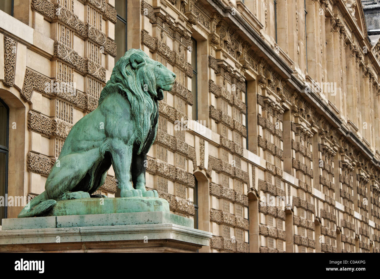 Lion statue outside the Louvre museum in Paris, France Stock Photo Alamy