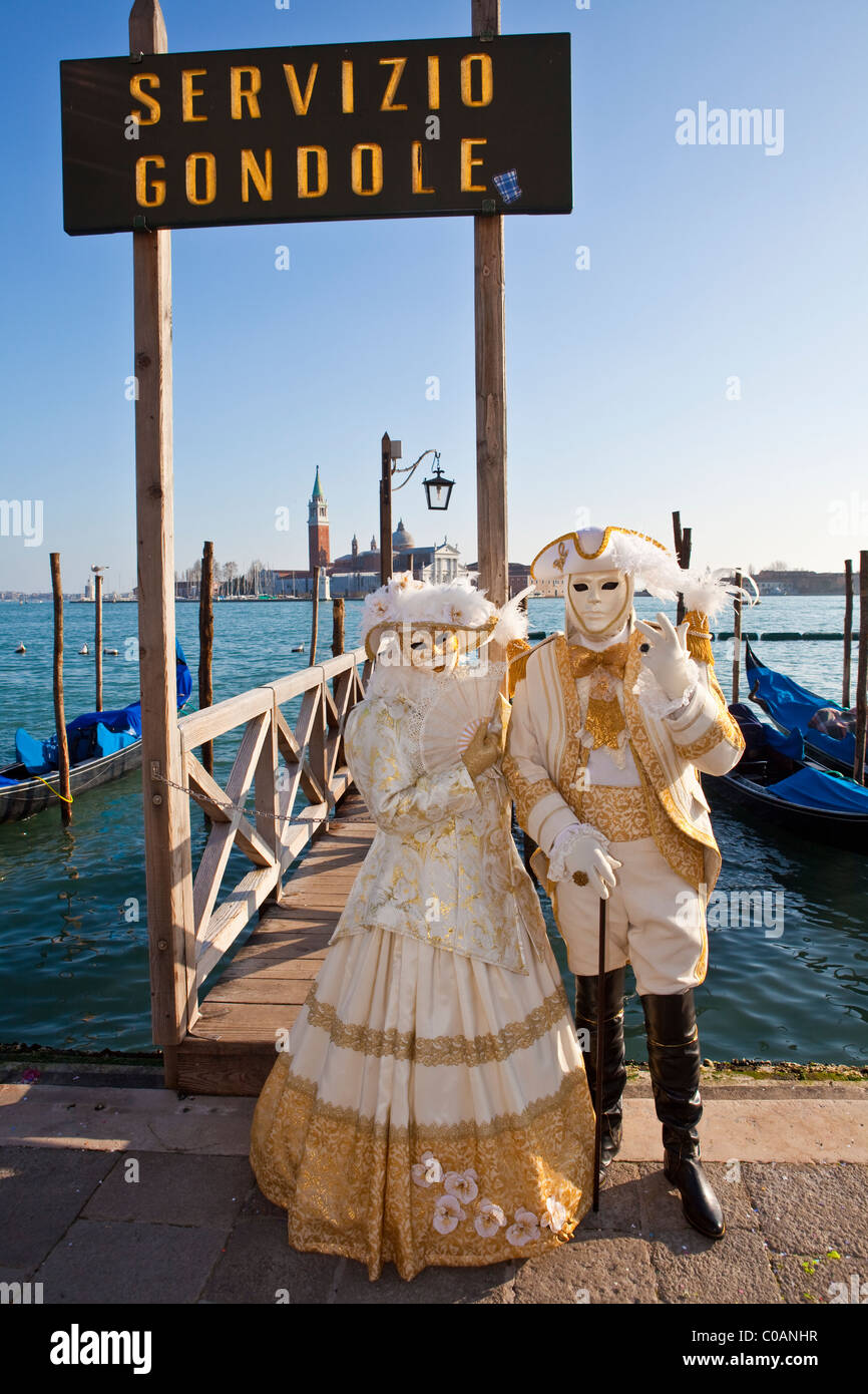 Two people in costume at the Venice Carnival Stock Photo - Alamy