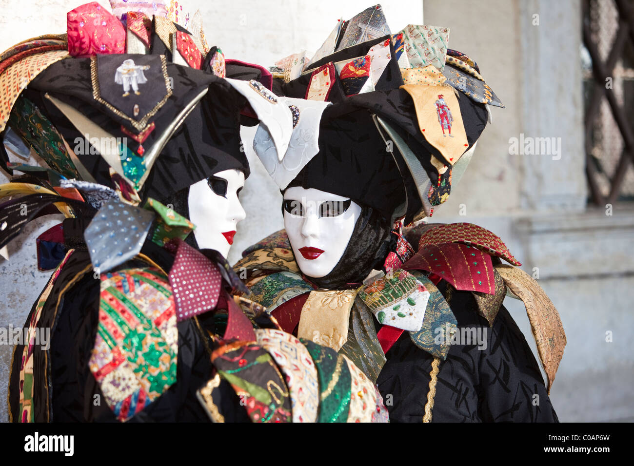 Two people in costume at the Venice Carnival Stock Photo - Alamy