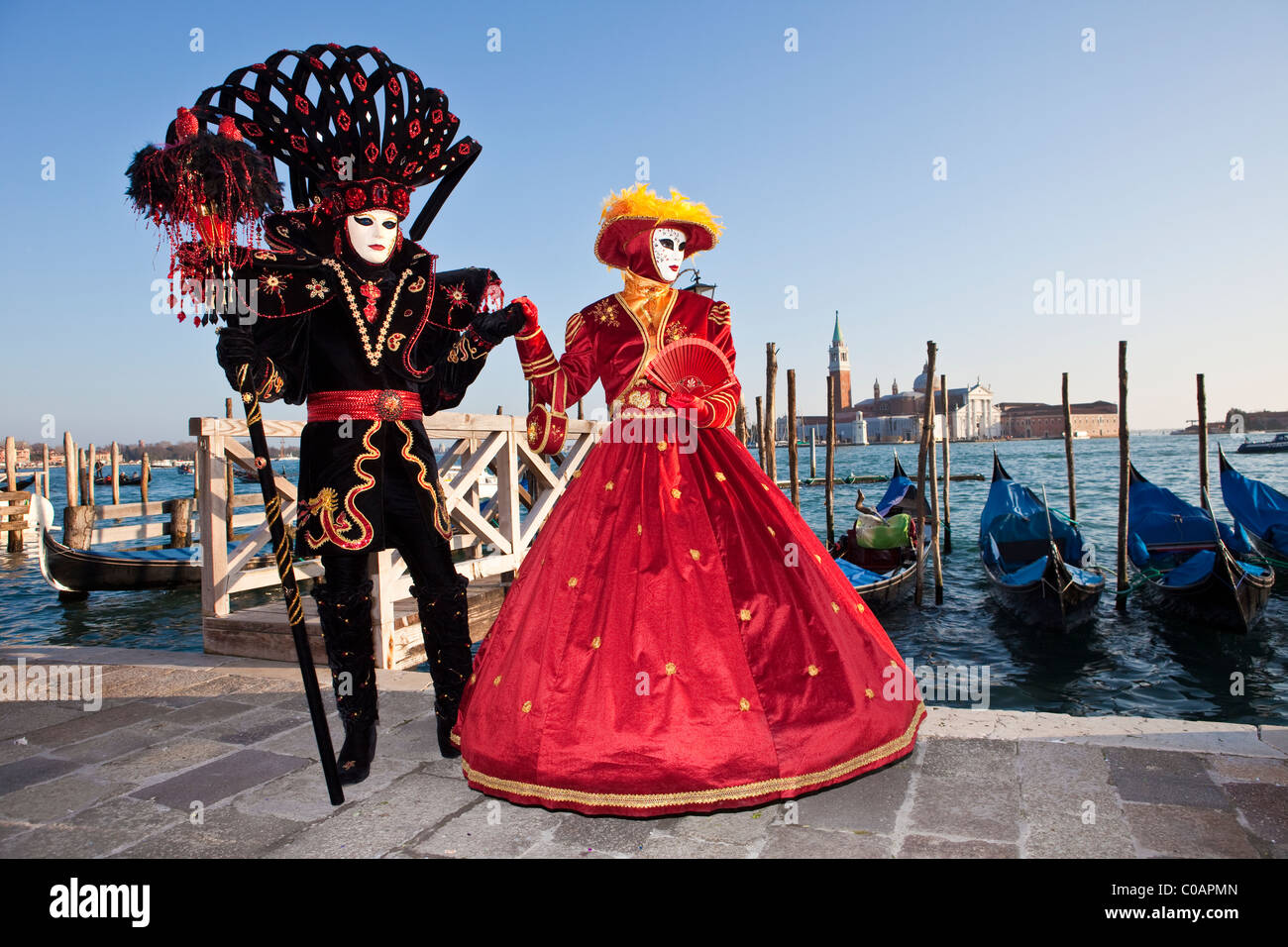 Two people costume at the Venice Carnival Stock Photo - Alamy