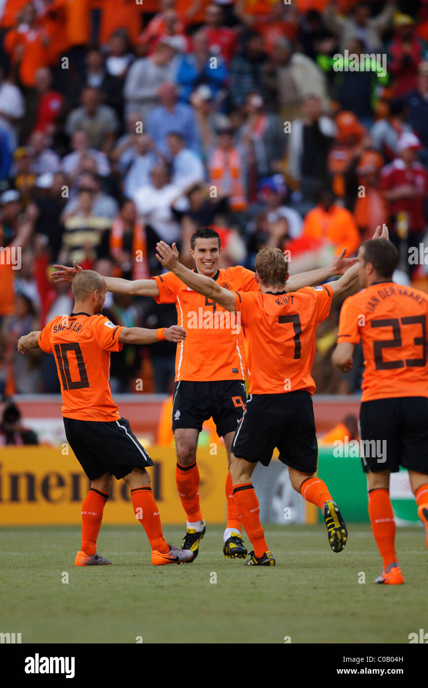 Robin van Persie of the Netherlands (9) celebrates after a goal against Denmark during a 2010 World Cup match against Denmark. Stock Photo