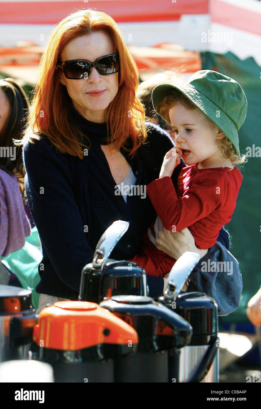Marcia Cross visits a farmers market in Brentwood with her daughter