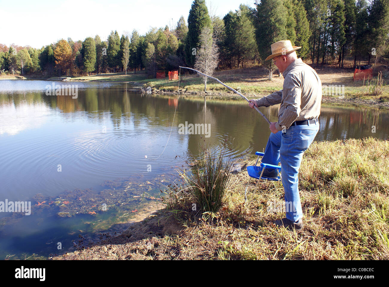 Cane pole fishing hi-res stock photography and images - Alamy