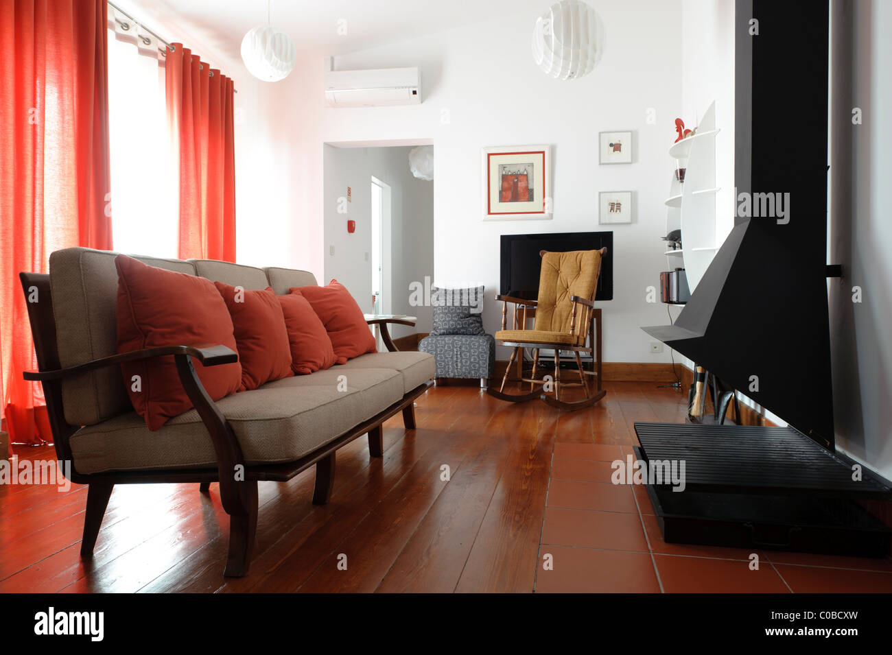 Living room with sofa and fireplace Stock Photo