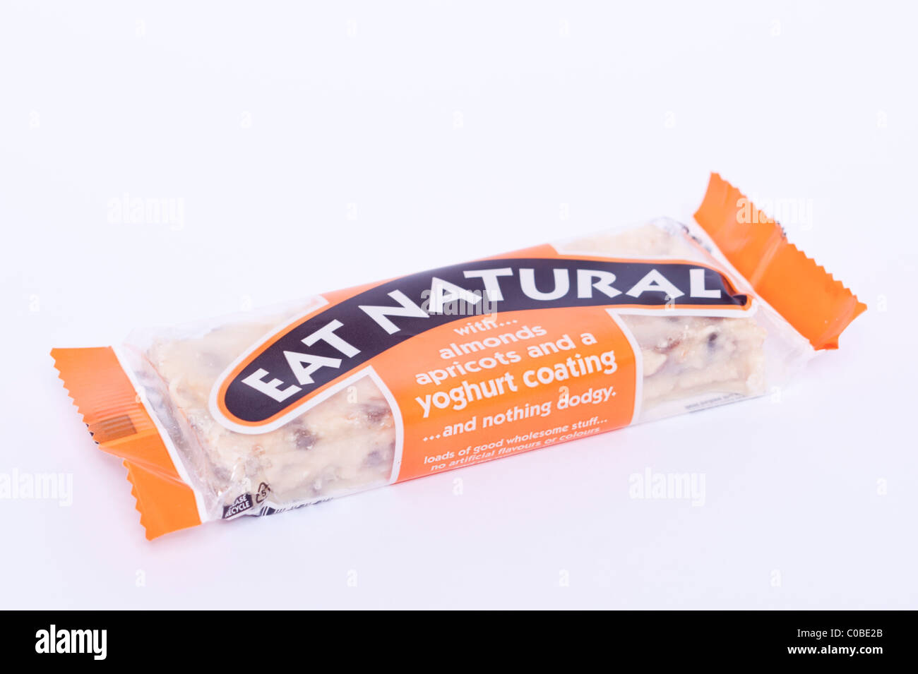 An almond and apricots Eat Natural cereal bar on a white background Stock Photo