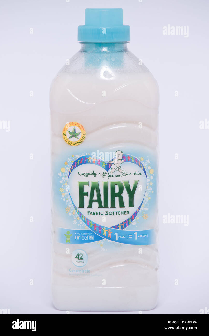A bottle of Fairy fabric softener for clothes washing on a white
