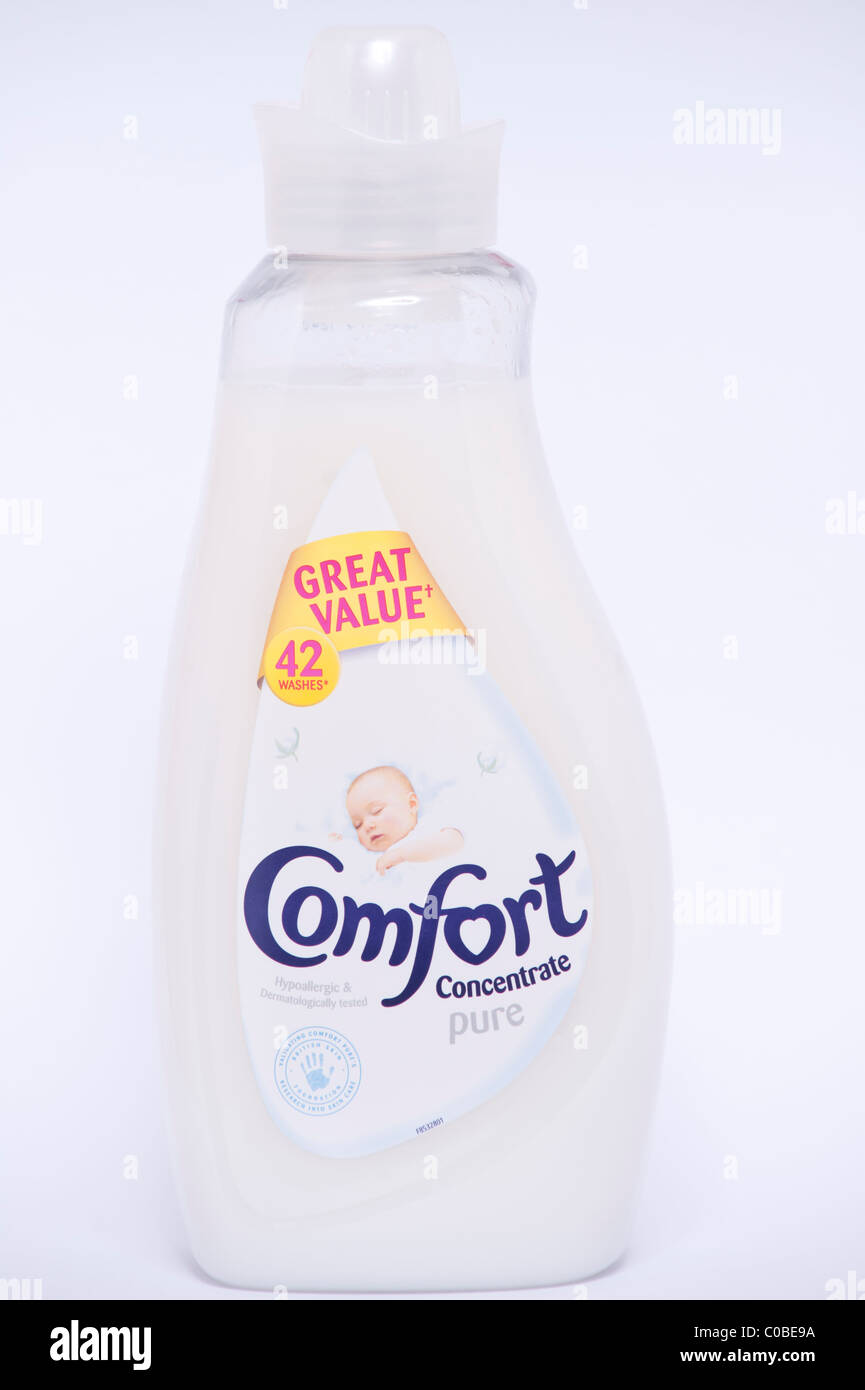 A bottle of Comfort pure fabric softener for clothes washing on a white background Stock Photo