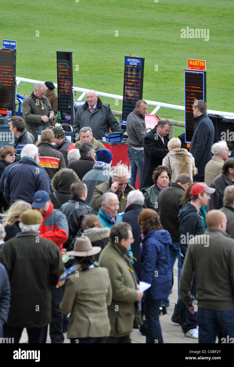 Punters and bookmakers beside the national Hunt racecourse at Fakenham. Stock Photo