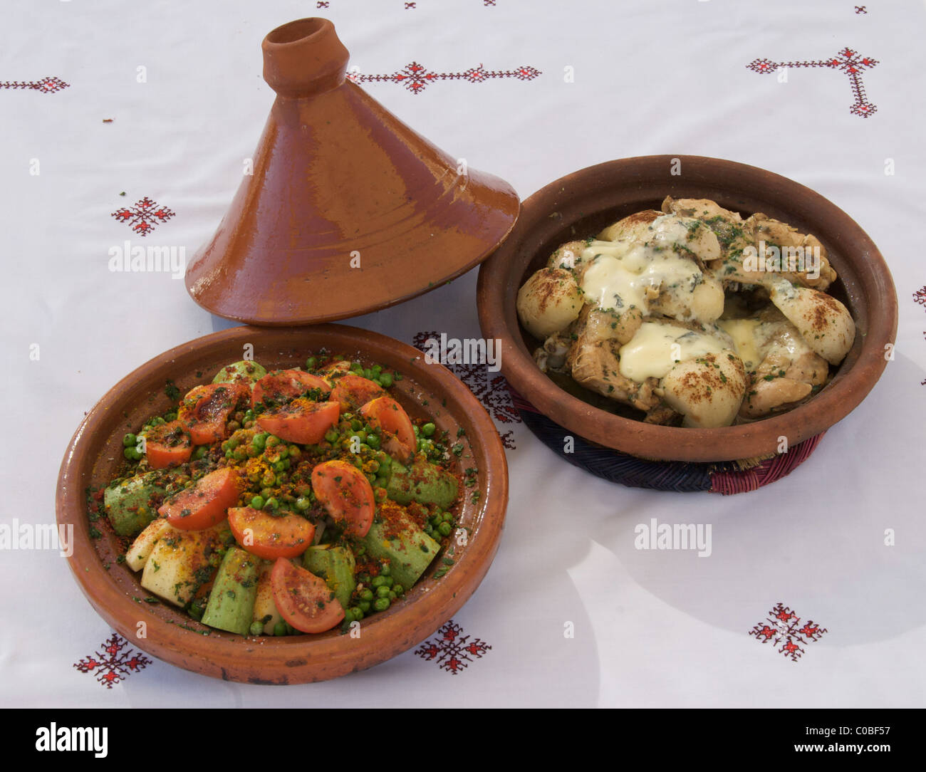 Tagines, typical Moroccan dishes, vegetable and chicken Stock Photo Alamy