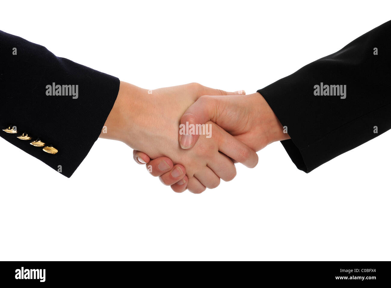 Women shaking hands isolated over white background Stock Photo