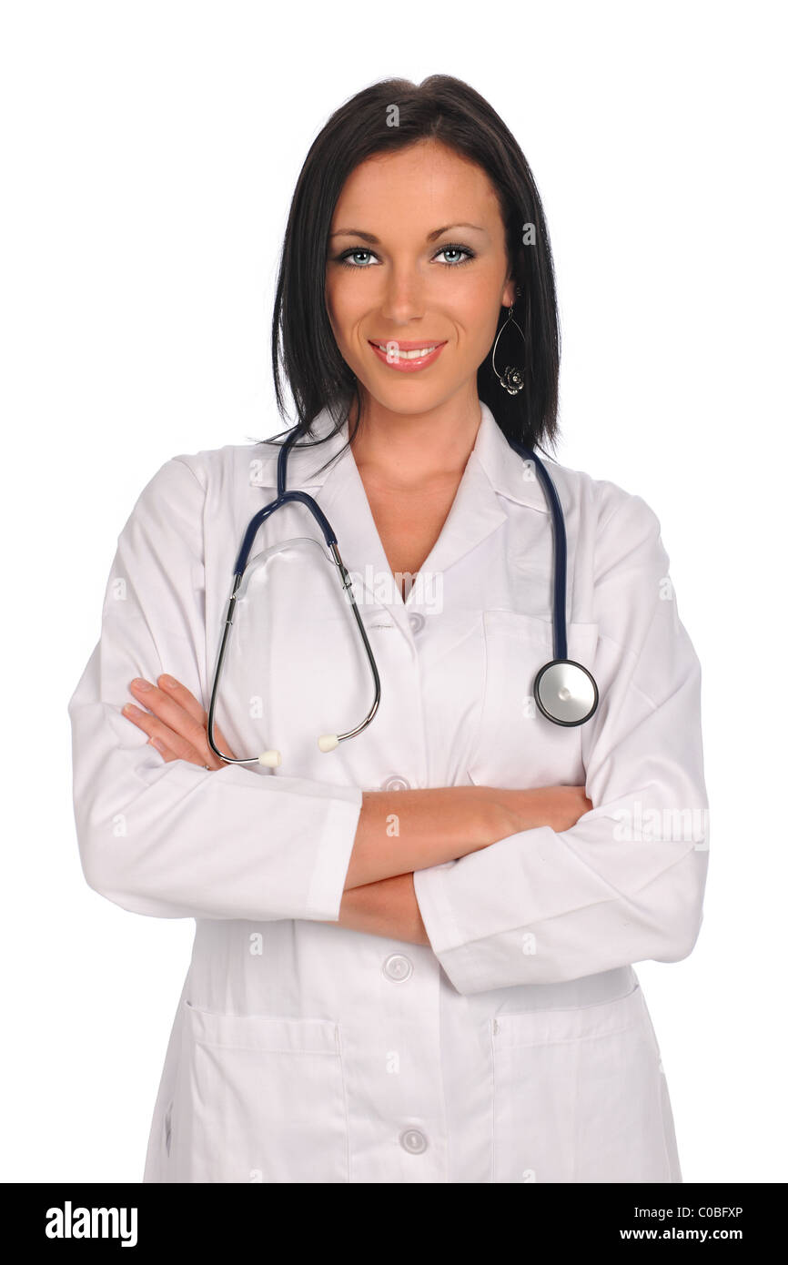 Portrait of doctor or nurse smiling with arms crossed isolated over white background Stock Photo