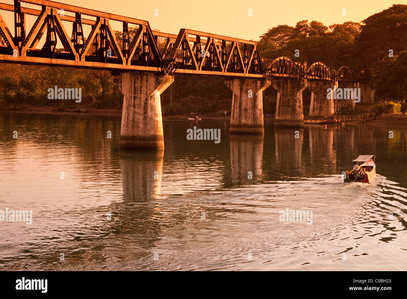 Saphan Mae Nam Khwae (Bridge on the River Kwai) at dusk, Kanchanaburi, Thailand Stock Photo