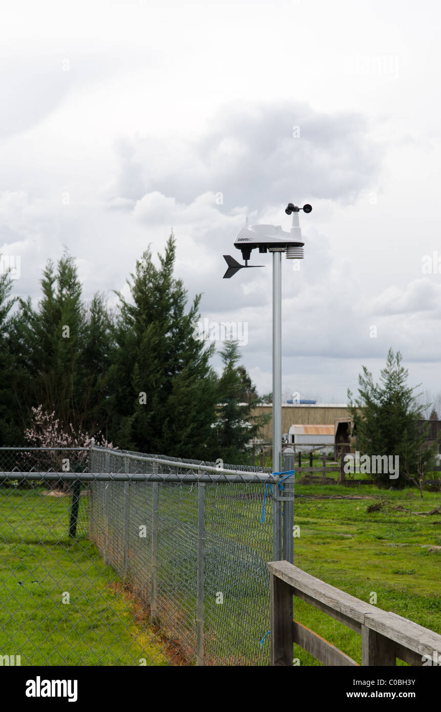 Davis home weather station with an anemometer and wind vane Stock Photo