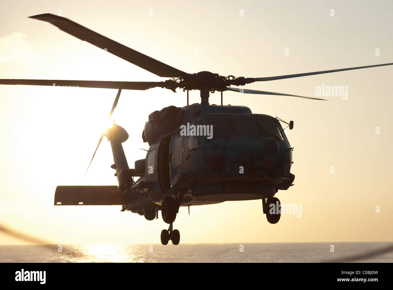 Navy Rescue Helicopter. Helo on USS Destroyer at sea on deployment
