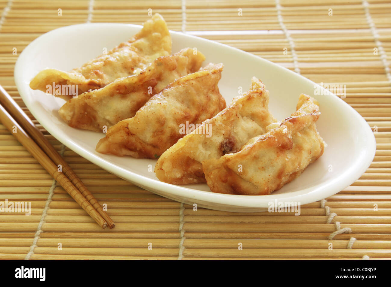 Fried Dumplings Chinese Style Cuisine as Meal Stock Photo
