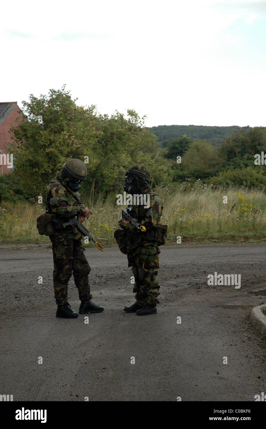 British solders in NBC chemical warfare suits during a training exercise Stock Photo