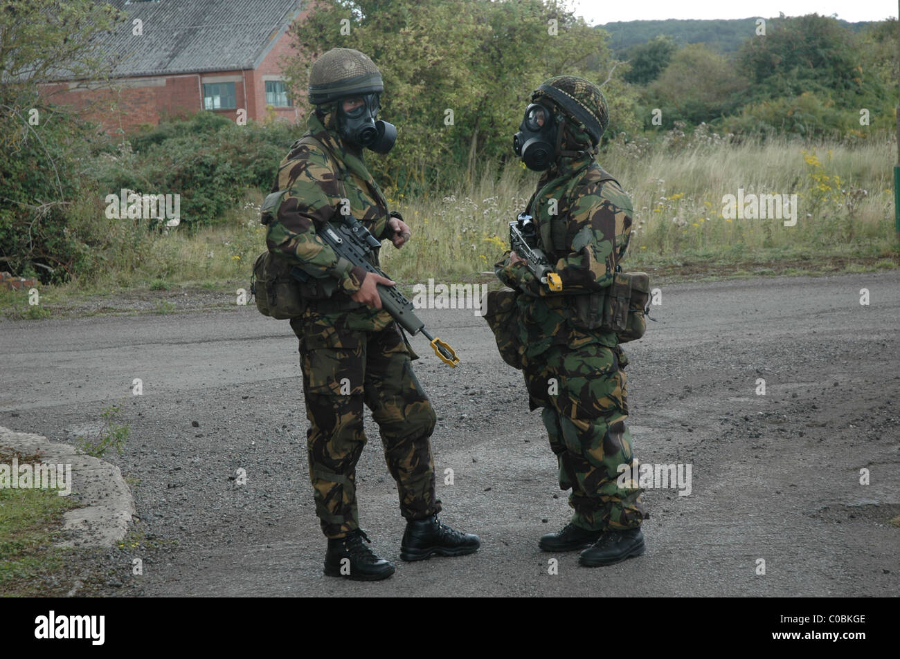 British solders in NBC chemical warfare suits during a training exercise Stock Photo