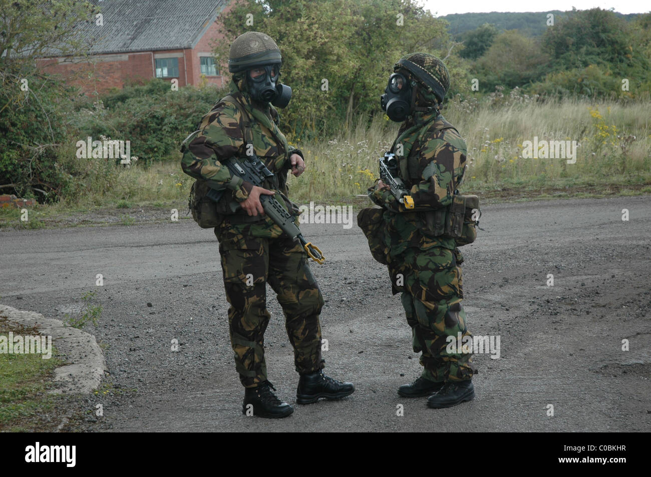 British solders in NBC chemical warfare suits during a training exercise Stock Photo