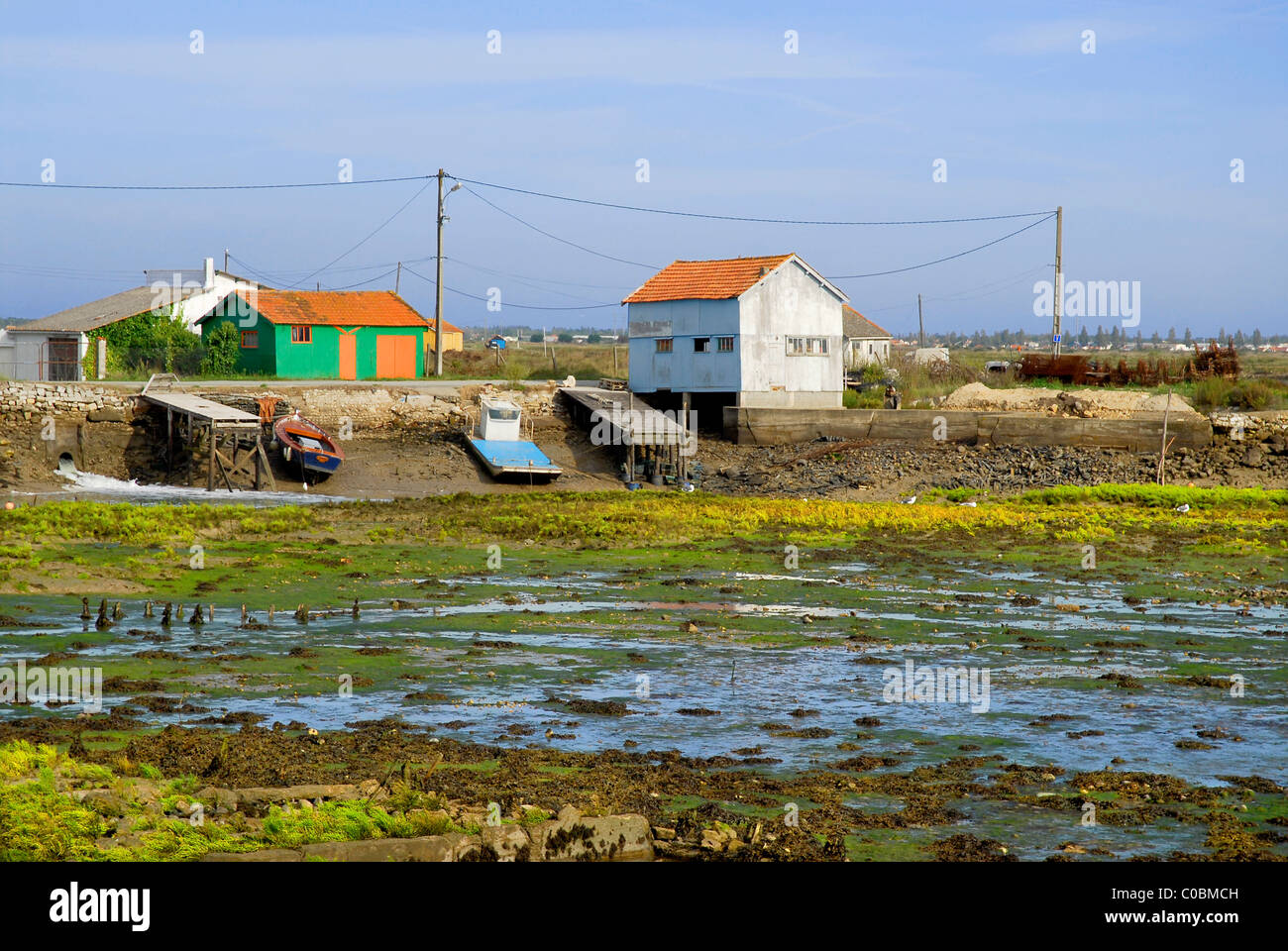 Saint Trojan Oleron in France, region oyster, at low tide, with fishermen huts in the background. Department Charente Maritime. Stock Photo