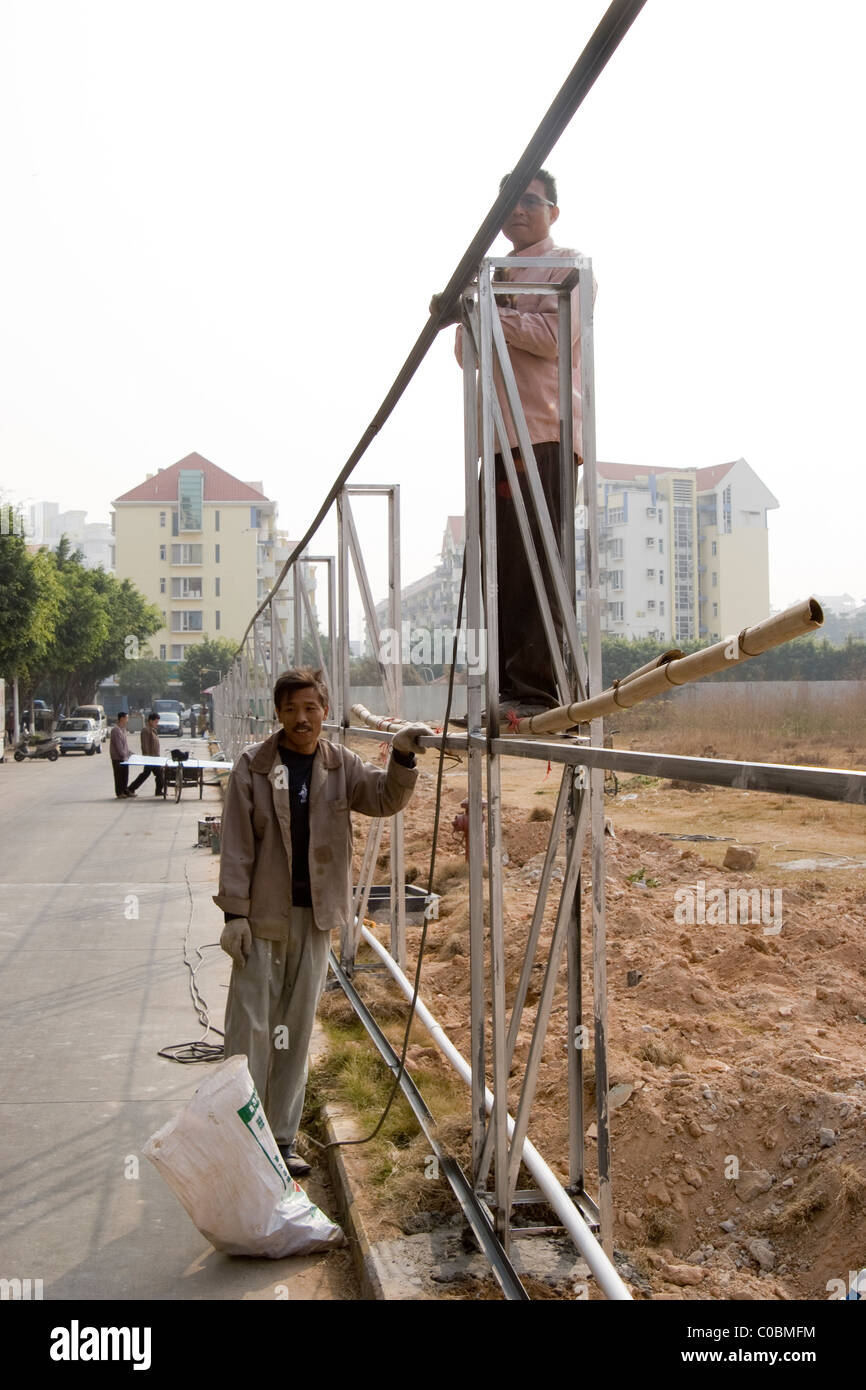 Chinese men at the building site in Dongguan Stock Photo