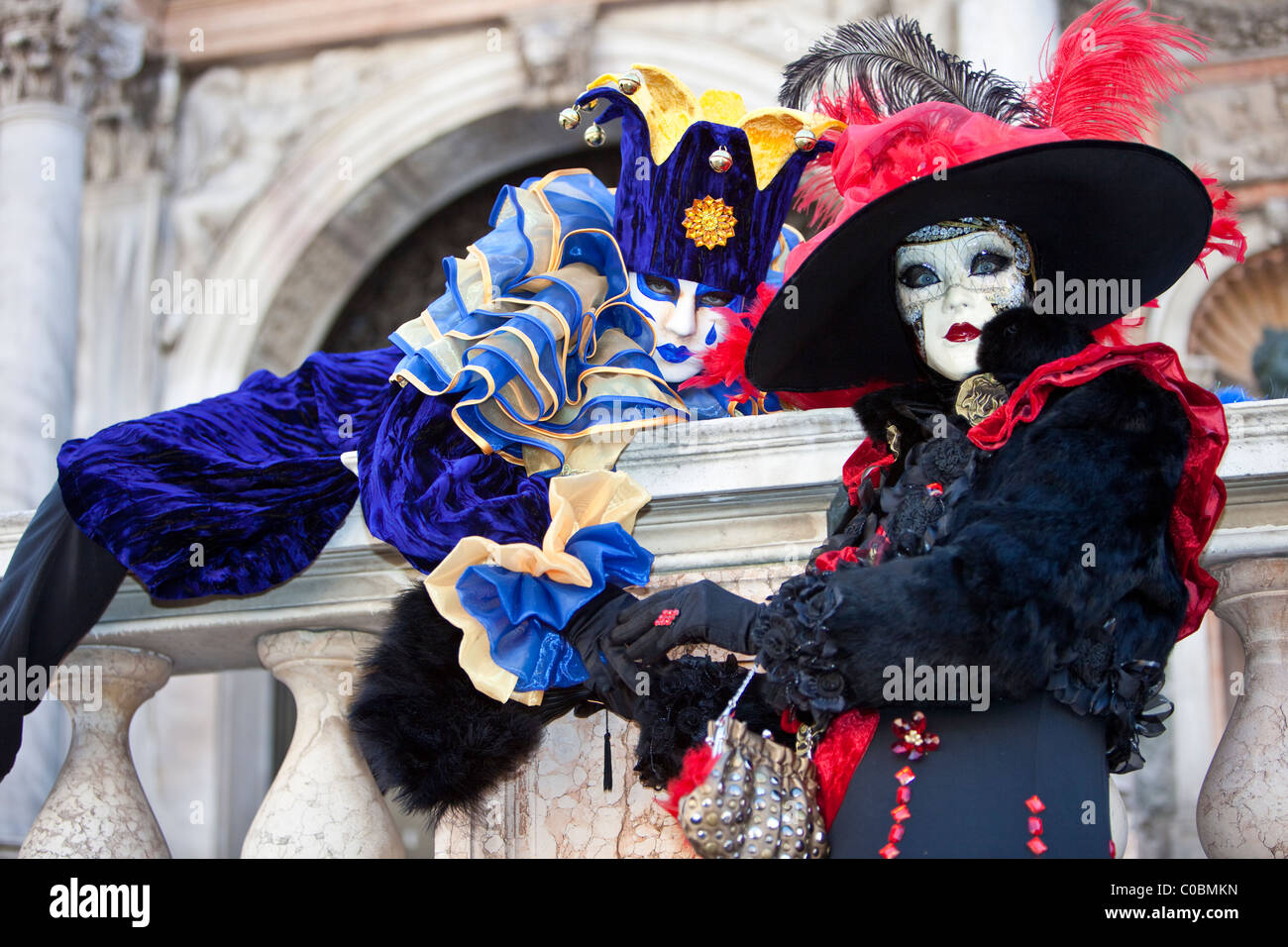 Two people in costume at the Venice Carnival Stock Photo - Alamy