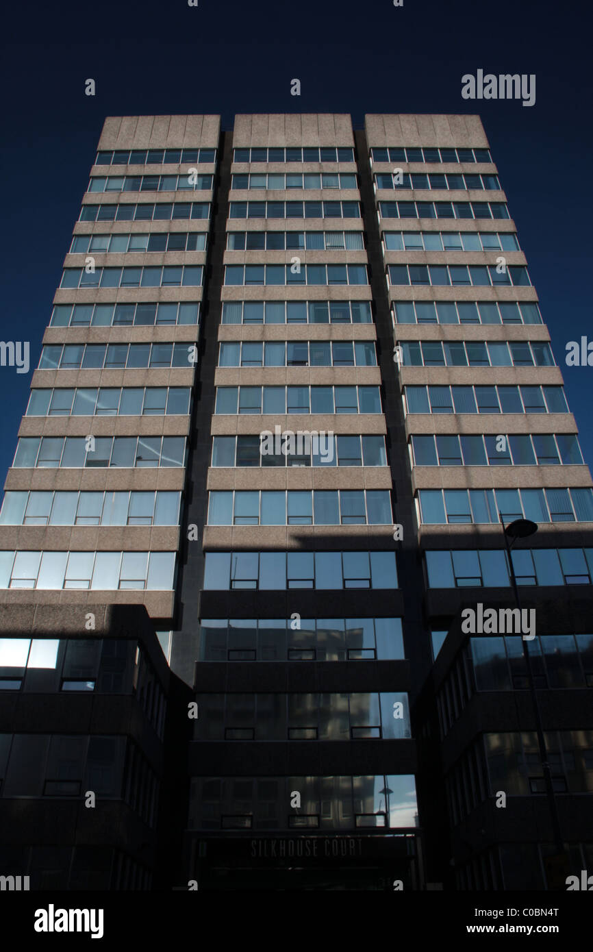 Modern office building shot against a deep blue sky Stock Photo - Alamy