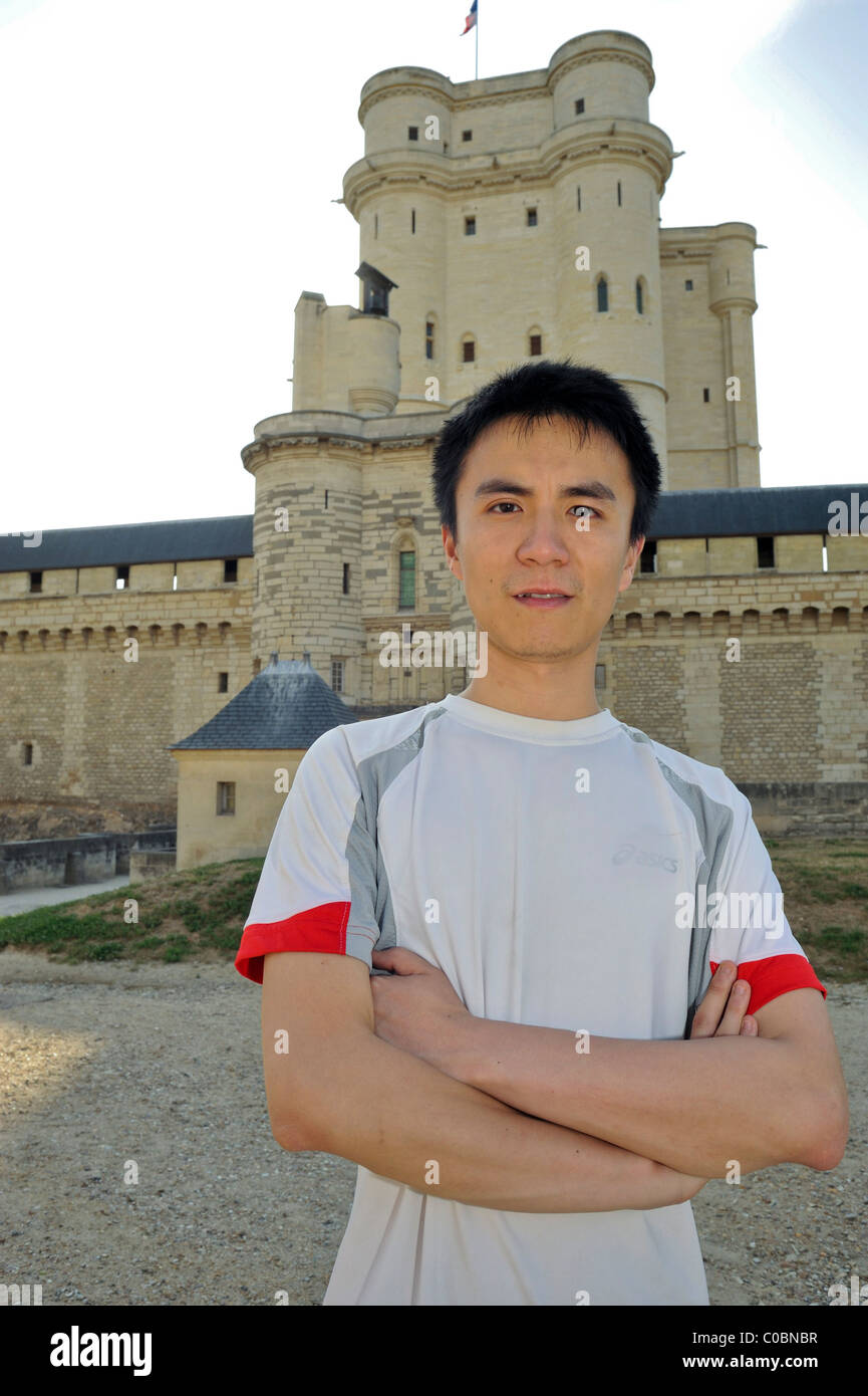 Paris, France, Portrait Young Chinese Student with arms crossed, Visiting 'Chateau de Vincennes', china portraits Stock Photo