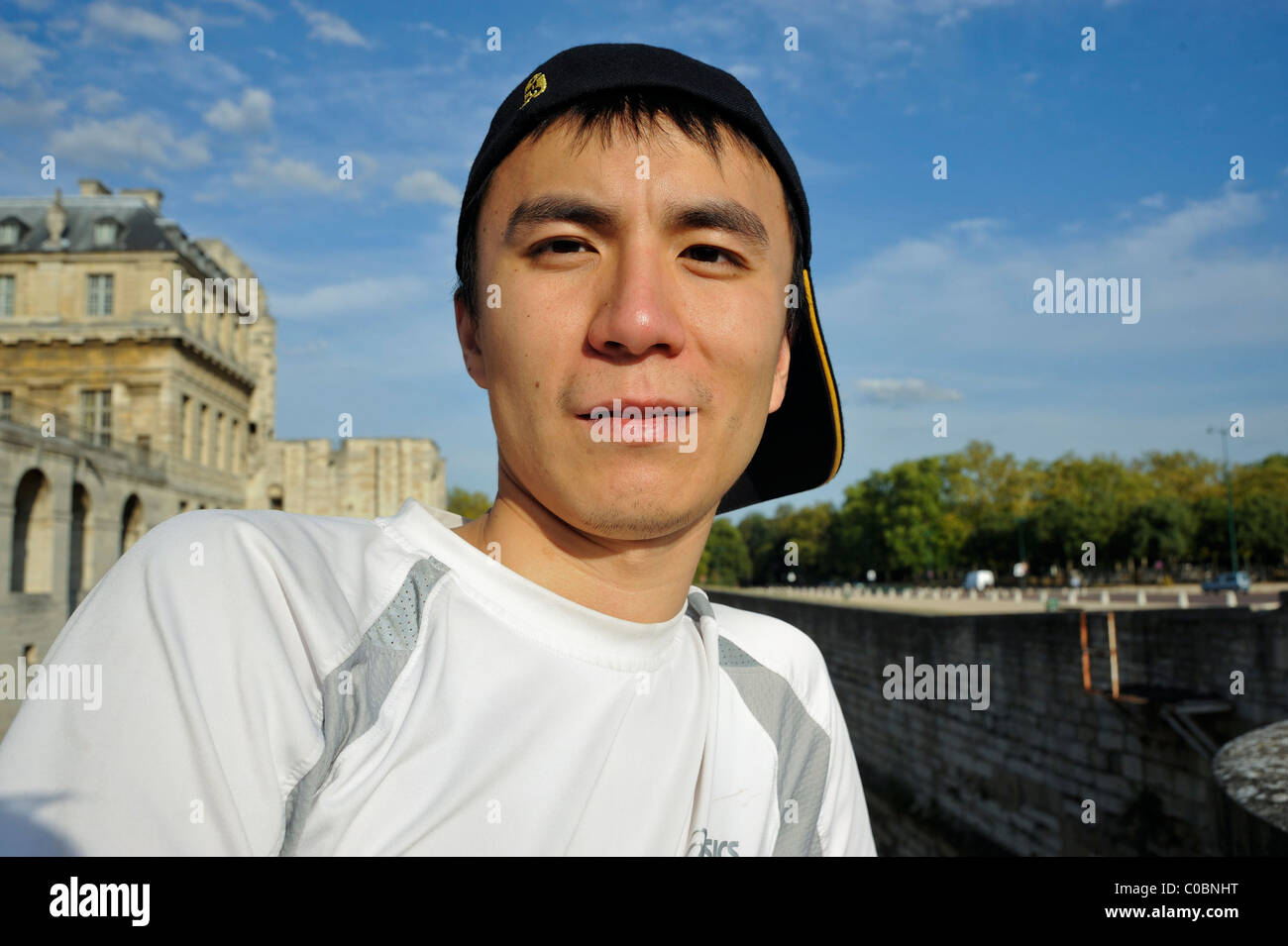 Paris, France, Portrait Young Chinese Man with hat, Visiting Chateau, asian man face Frontal  outside, china portraits Stock Photo
