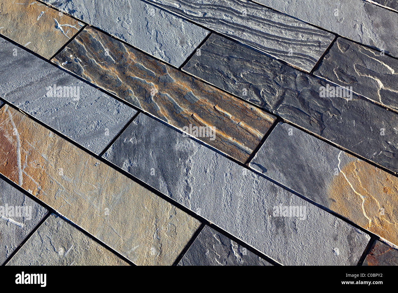 Paving stone with ripple marks and natural features Ebbw Vale Wales UK Stock Photo