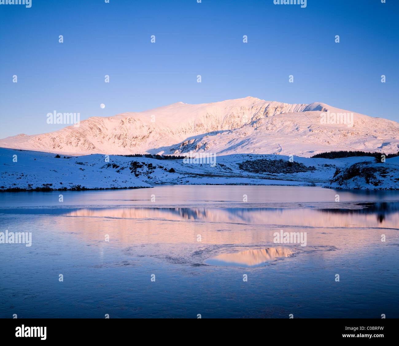 Winter moonrise over Snowdon and Llyn Y Dywarchen, Snowdonia National
