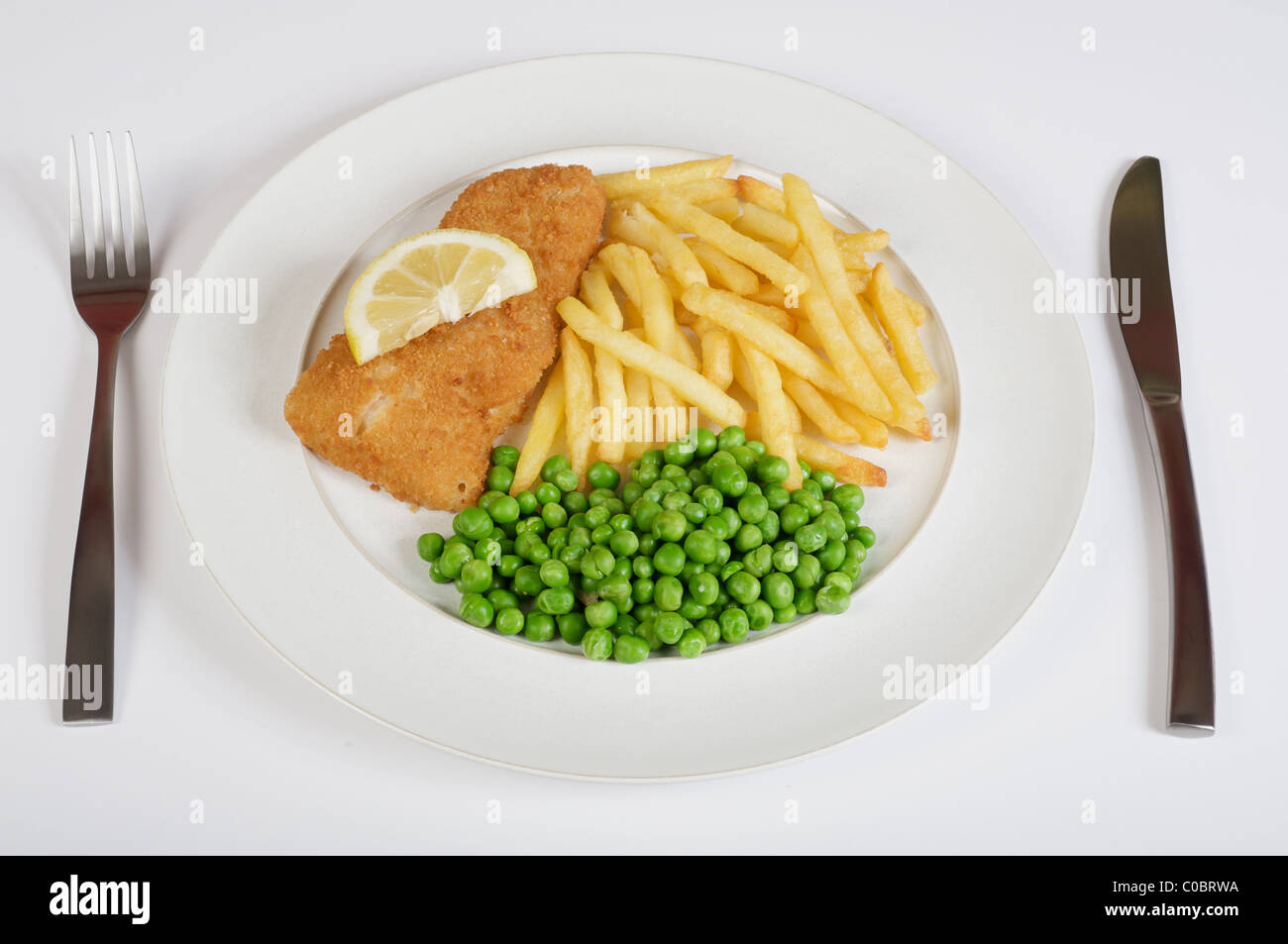 Frozen fish chips and peas Stock Photo