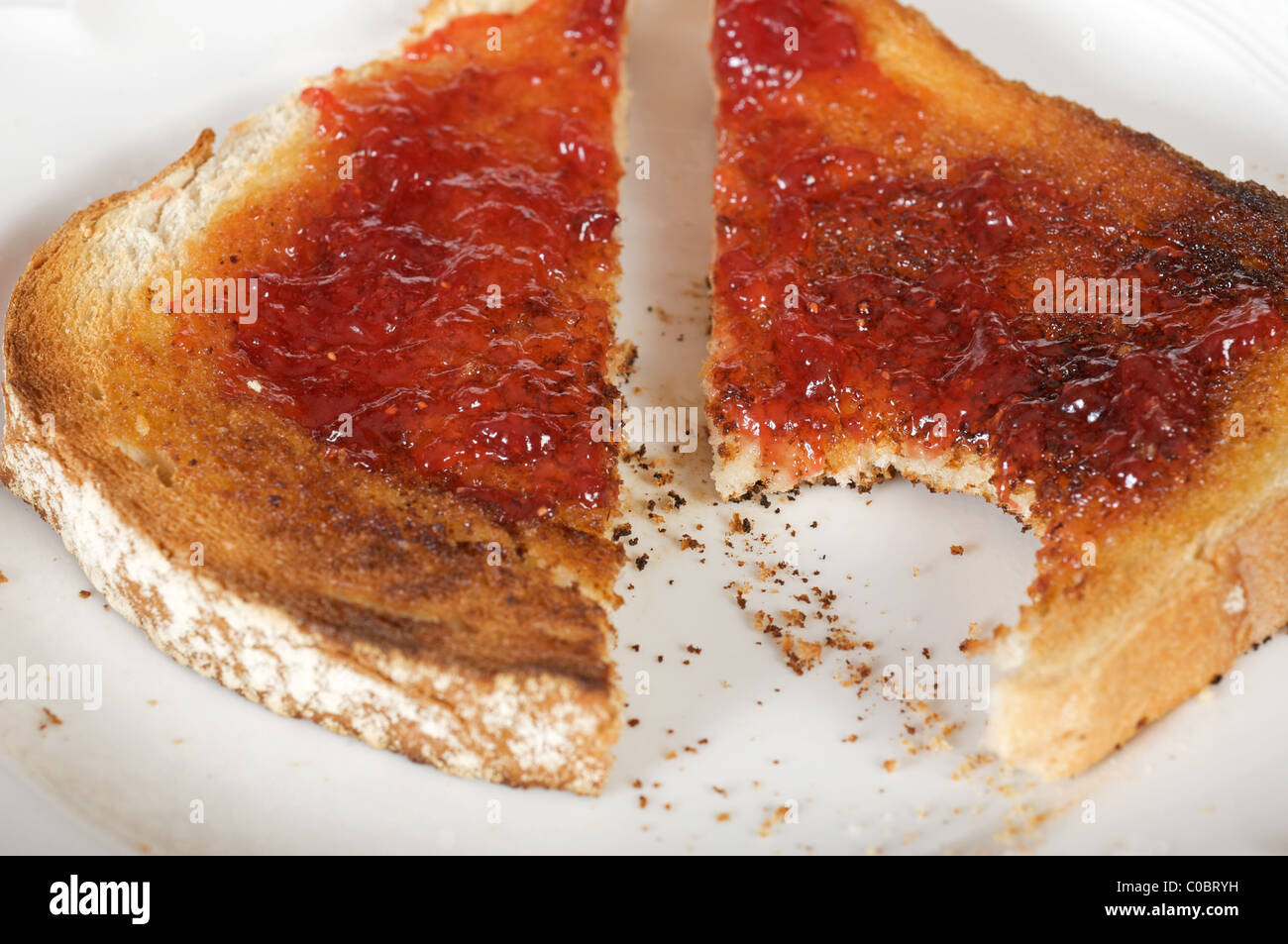 Strawberry jam on toast Stock Photo Alamy