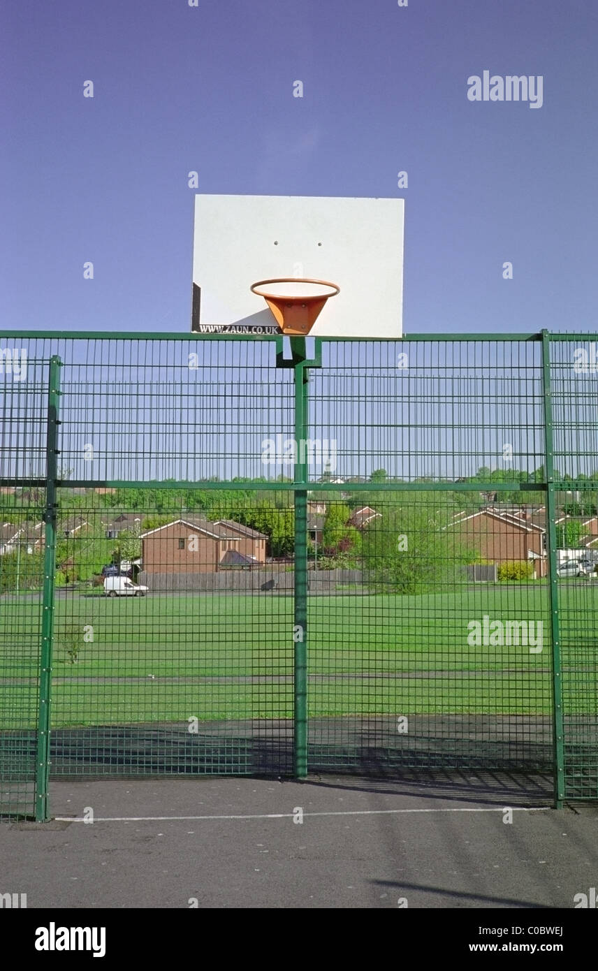 Public Basketball Court set in a Public Recreational Area Stock Photo