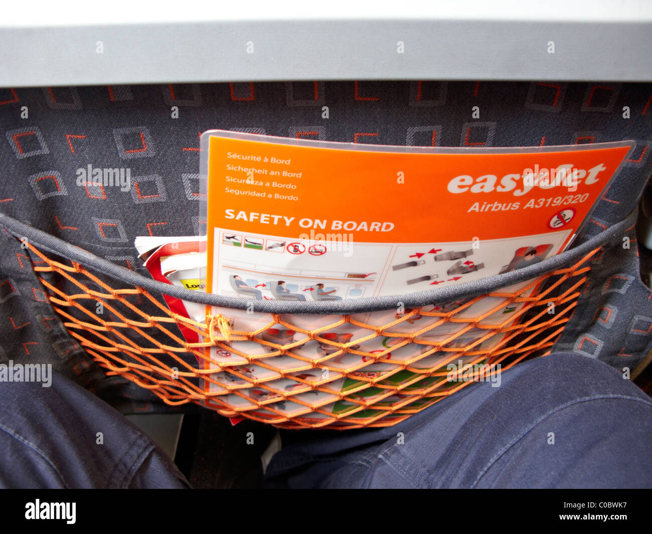 safety on board card in seat pocket of easyjet a319 airbus aircraft Stock Photo