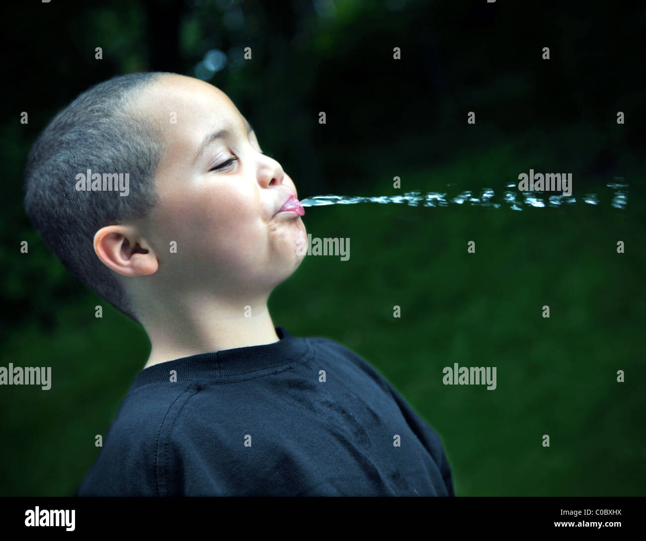 Spitting boy hi-res stock photography and images - Alamy