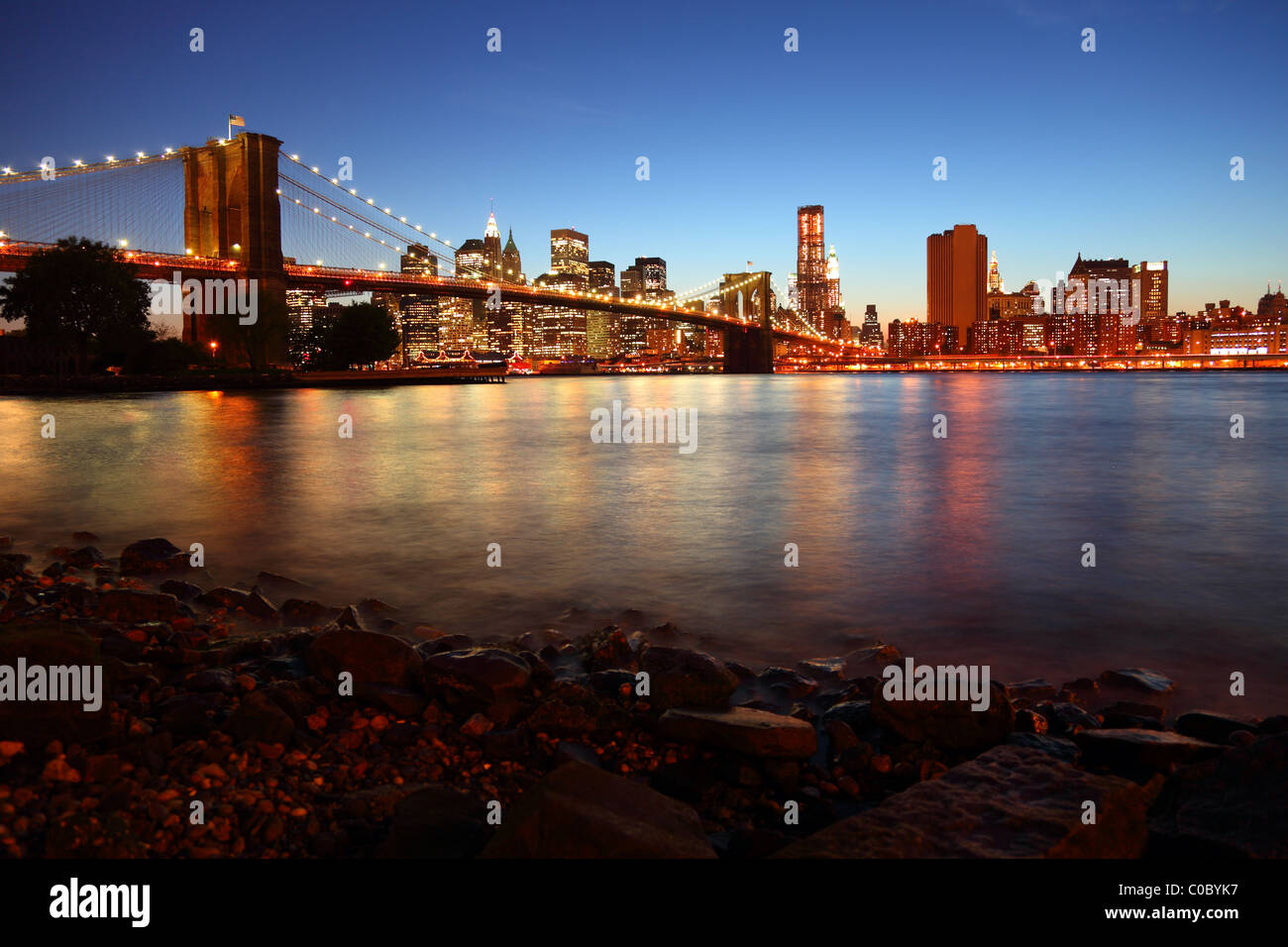 Sunset over historic Brooklyn Bridge in New York City Stock Photo - Alamy