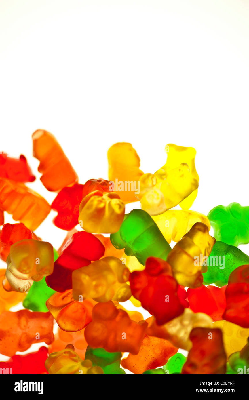Bright, backlit, Gummi Bears isolated on a white background. Stock Photo