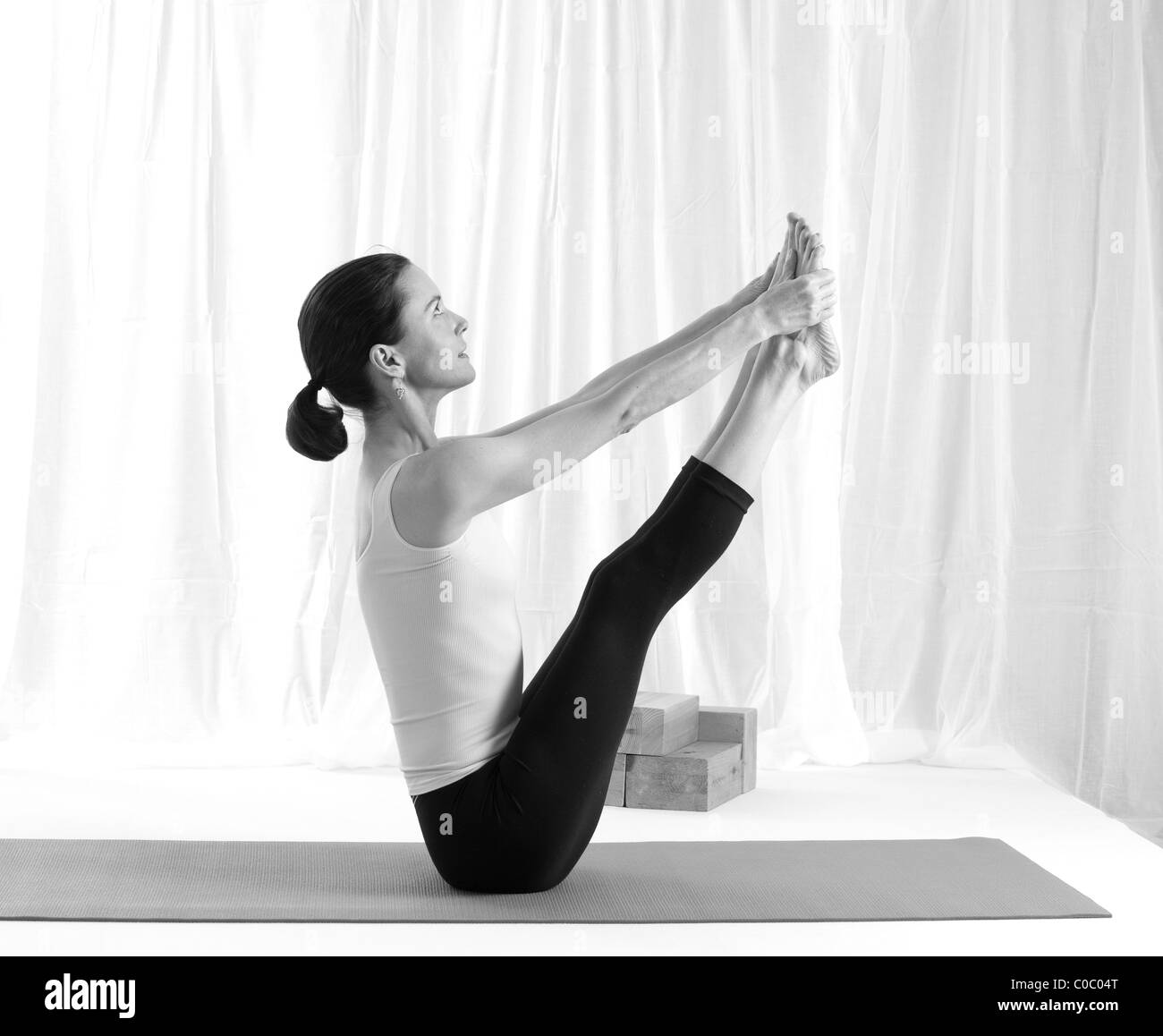 yoga poses,balances,relaxation,backbends,salamba, forward bends Stock Photo