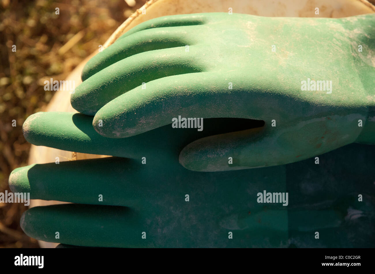Green rubber work gloves Stock Photo Alamy