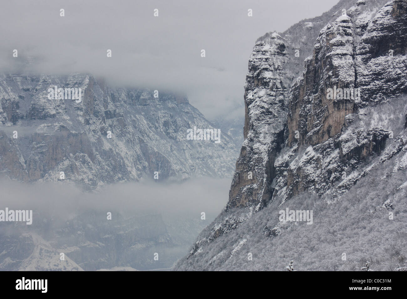 Mountains hidden in clouds, Trentino, Italy Stock Photo