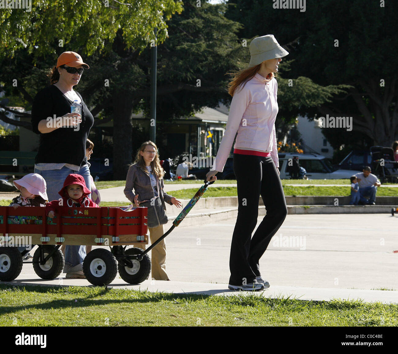 Marcia Cross visiting a park with her twin daughters, Eden and Savannah